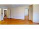 Bedroom featuring hardwood floors, mirrored closet doors, and neutral walls at 1849 Abrico Dr # K9, Lutz, FL 33558