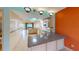 Bright kitchen featuring granite countertops, stainless steel appliances, and an eat-in island at 1849 Abrico Dr # K9, Lutz, FL 33558