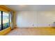 Bright living room with tile floors, neutral paint, and a large window at 1849 Abrico Dr # K9, Lutz, FL 33558