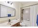 Full bathroom with vanity, tub with shower, and a large mirror at 20254 Ravens End Dr, Tampa, FL 33647