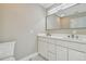 Bathroom with double sink, modern cabinets, and neutral color scheme offers a relaxing experience at 2042 Craft Ln, Sarasota, FL 34239