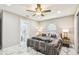 Bright bedroom featuring a closet and a glimpse into a luxurious bathroom, offering comfort and convenience at 2042 Craft Ln, Sarasota, FL 34239