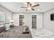 Bedroom featuring stylish marble floors and closet spaces offering plenty of storage at 2042 Craft Ln, Sarasota, FL 34239