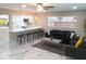 Inviting living area seamlessly connected to the kitchen with ample seating at 2042 Craft Ln, Sarasota, FL 34239