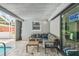 Outdoor patio with stylish seating and view of the private swimming pool at 2042 Craft Ln, Sarasota, FL 34239