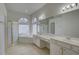 Spacious bathroom featuring a corner tub, shower and dual sink vanity at 21215 Tyrell Way, Land O Lakes, FL 34638
