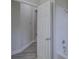 Bathroom featuring a white tiled shower-tub combo with gray flooring at 21215 Tyrell Way, Land O Lakes, FL 34638