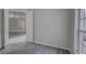 Bright bedroom with wood-look flooring and neutral walls, perfect for relaxation at 21215 Tyrell Way, Land O Lakes, FL 34638
