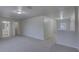 Upstairs bonus room features neutral carpeting, bathroom access, and natural light at 21215 Tyrell Way, Land O Lakes, FL 34638