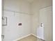 Laundry room featuring a utility sink, washer/dryer hookups and a door to the exterior at 21215 Tyrell Way, Land O Lakes, FL 34638