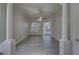 Bright living room with wood floors and sliding glass doors leading to a pool at 21215 Tyrell Way, Land O Lakes, FL 34638
