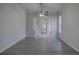Bright living room with wood-look floors, archways, and open floor plan with modern lighting at 21215 Tyrell Way, Land O Lakes, FL 34638
