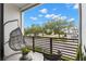 Outdoor balcony with seating and views of the surrounding neighborhood; a great place to relax at 214 S Audubon Ave, Tampa, FL 33609