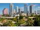 Scenic city view of Tampa featuring modern skyscrapers and lush greenery in a vibrant urban setting at 214 S Audubon Ave, Tampa, FL 33609