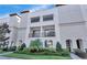 A three-story condominium building with beautifully manicured landscaping provides excellent curb appeal at 214 S Audubon Ave, Tampa, FL 33609