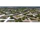 Aerial view of the community featuring mature trees, parking, and roads at 2284 Philippine Dr # 7, Clearwater, FL 33763