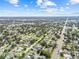 Extensive aerial shot of a residential area, showing mature trees and numerous homes at 2435 37Th N Ave, St Petersburg, FL 33713