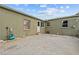 Backyard view showing a concrete patio and the exterior of the home at 2435 37Th N Ave, St Petersburg, FL 33713