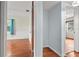 Bedroom featuring hardwood floors and two closets with access to another room at 2435 37Th N Ave, St Petersburg, FL 33713