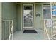 A close-up of the front door with a screen, showcasing security and a welcoming entrance at 2435 37Th N Ave, St Petersburg, FL 33713