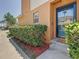 Charming front entrance with well-maintained landscaping at 2530 Sandy Beach Ln, Clearwater, FL 33763