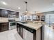 Granite countertops and lots of storage in the cabinets at 2530 Sandy Beach Ln, Clearwater, FL 33763