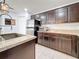 Spacious kitchen with granite countertops and stainless steel appliances at 2530 Sandy Beach Ln, Clearwater, FL 33763
