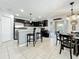 Eat-in kitchen area and sliding glass doors to a patio at 2530 Sandy Beach Ln, Clearwater, FL 33763