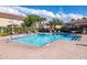 Sparkling community pool with lounge seating and play area at 2530 Sandy Beach Ln, Clearwater, FL 33763