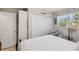 Comfortable bedroom with closet and natural lighting at 2810 Doone Cir, Palm Harbor, FL 34684