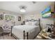 Cozy bedroom with natural light and decorative accents at 2810 Doone Cir, Palm Harbor, FL 34684