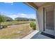 Back patio with a view of the community lake at 31970 Blue Passing Loop, Wesley Chapel, FL 33545