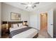 Comfortable bedroom with ensuite bathroom, and ample closet space at 31970 Blue Passing Loop, Wesley Chapel, FL 33545