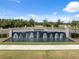 Epperson community entrance showcasing a stylish water fountain and landscaping, offering a welcoming first impression at 31970 Blue Passing Loop, Wesley Chapel, FL 33545