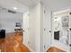 Hallway view leading to living area and a bathroom at 3302 W Beaumont St, Tampa, FL 33611
