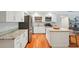 Bright kitchen features granite countertops, stainless steel appliances, and a functional island at 3302 W Beaumont St, Tampa, FL 33611