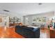 Bright and airy living room featuring beautiful hardwood floors and comfortable furnishings at 3302 W Beaumont St, Tampa, FL 33611
