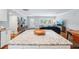Open-concept living space featuring a kitchen island and a seamless flow to the living area at 3302 W Beaumont St, Tampa, FL 33611