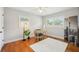 Charming office with wood floors, stylish desk, and plantation shutters for adjustable light at 3302 W Beaumont St, Tampa, FL 33611