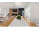 Elegant dining room with a modern chandelier, stylish decor, and open access to other living spaces at 3436 Manatee Se Dr, St Petersburg, FL 33705