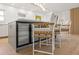 Well-lit kitchen featuring island seating, modern cabinets, and stainless steel appliances at 3436 Manatee Se Dr, St Petersburg, FL 33705