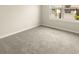 Bedroom featuring carpeted flooring and natural light at 3472 Timber Crossing Ave, Brandon, FL 33511