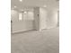 Large upstairs loft area with carpeting, recessed lighting, and neutral paint at 3472 Timber Crossing Ave, Brandon, FL 33511