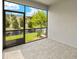 Screened-in patio with brick flooring and a view of the backyard at 3472 Timber Crossing Ave, Brandon, FL 33511