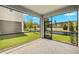 Screened-in patio offering relaxing outdoor views and neutral tones at 3472 Timber Crossing Ave, Brandon, FL 33511