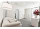 Neutral bedroom with white walls and plush gray carpet providing comfort at 35780 Sunflower Hill Dr, Zephyrhills, FL 33541