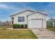 Charming single-Gathering home showcasing a well-maintained lawn and inviting curb appeal at 3730 Elmwood Dr, Holiday, FL 34691
