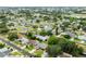 Residential neighborhood with single Gathering homes and mature tree coverage at 4017 103Rd N Ave, Clearwater, FL 33762