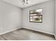 Bedroom with hard surface flooring, a ceiling fan and a window at 4017 103Rd N Ave, Clearwater, FL 33762