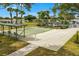 Well-maintained community area featuring a bocce ball court, manicured landscaping, and lush green grass at 4017 103Rd N Ave, Clearwater, FL 33762